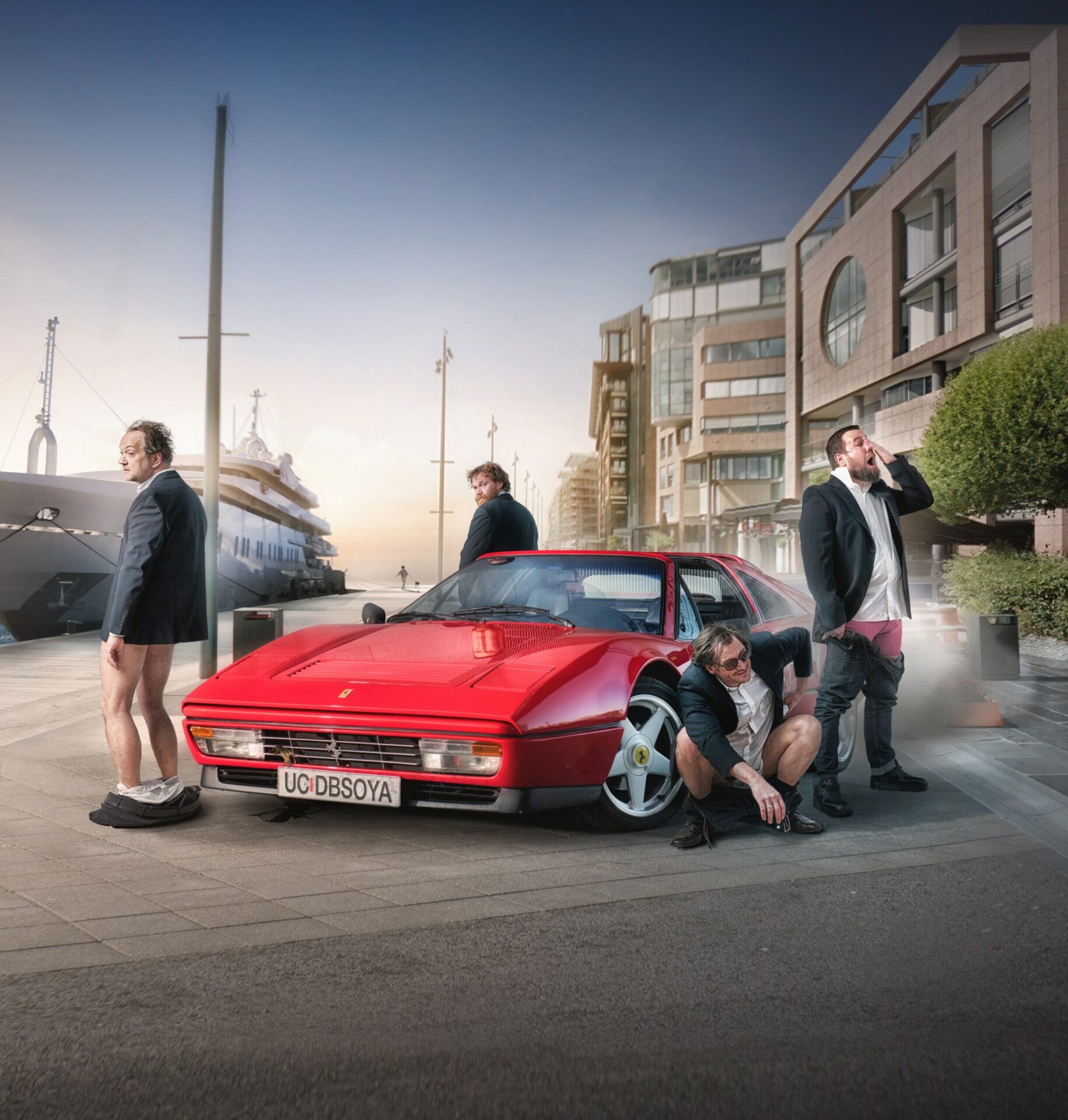 GArd B Eidsvoll, Cato Skimten Storengen, Kim Sørensen og Per Kjerstad sammen med en rød ferrari.
